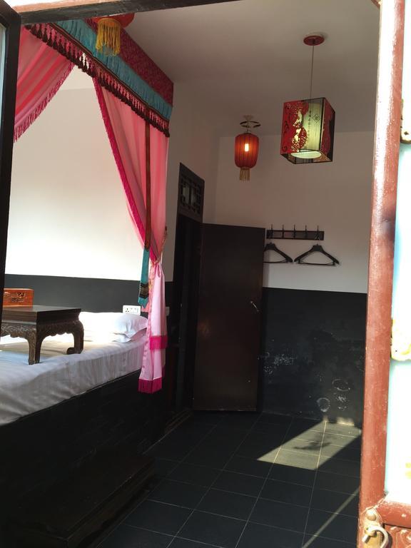 Pingyao Dejuyuan Hotel Kamer foto